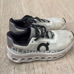 On Running Athletic Shoes in White and Black